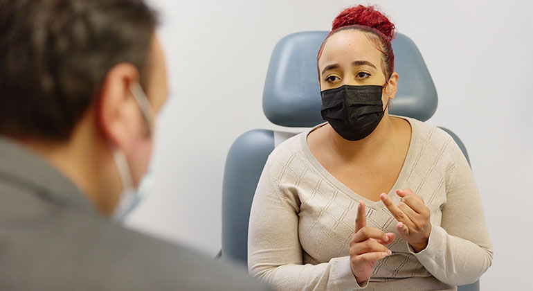 Image of doctor talking to patient