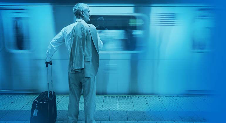 Image of man waiting for subway train