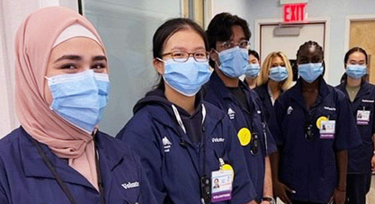 Image of volunteers wearing masks