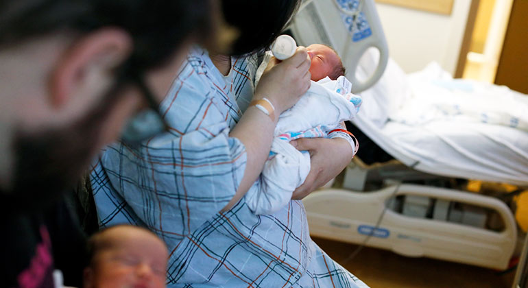 Image of mother holding baby