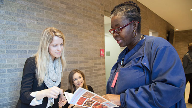 Nurse talking to patient