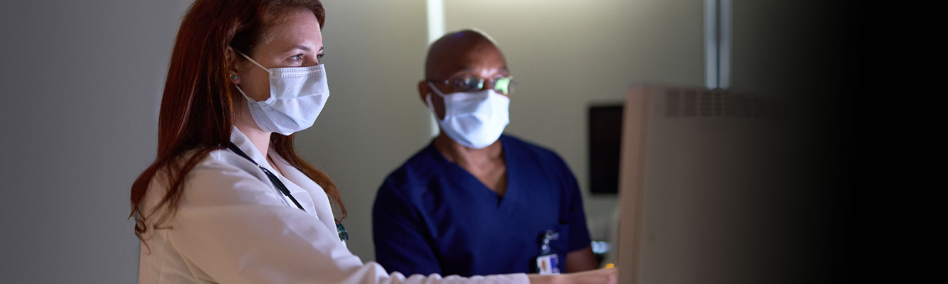 Image of doctors looking at test results