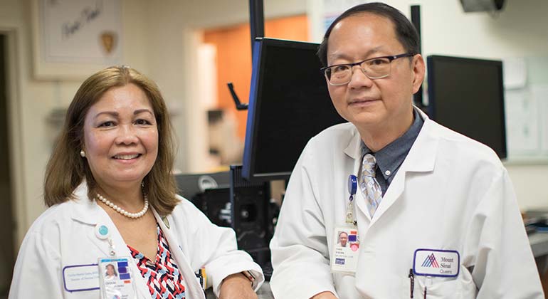 Male and female doctor from Mount Sinai Queens in a work area