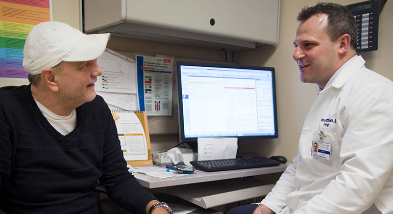 patient with doctor during visit