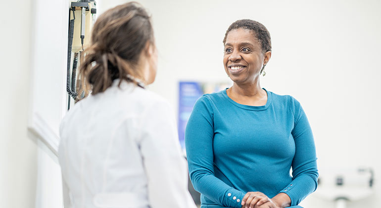 Doctor with her patient in the office