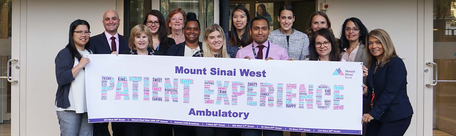 Group holding sign that reads "Mount Sinai West Patient Experience Ambulatory"