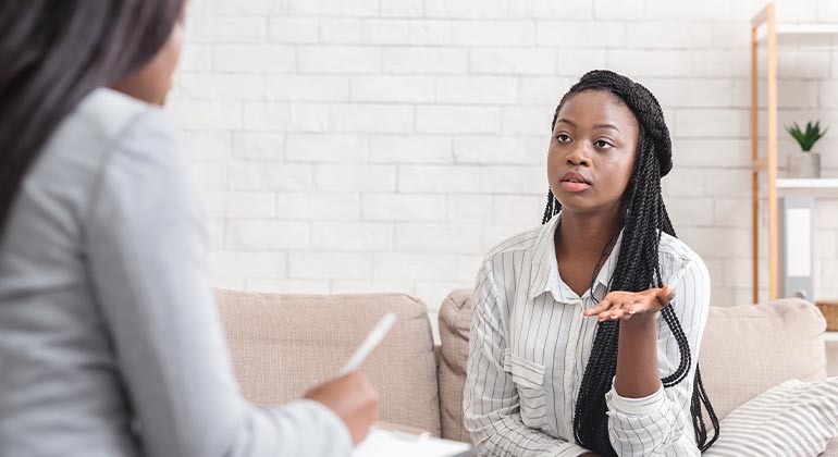 Patient speaking to doctor