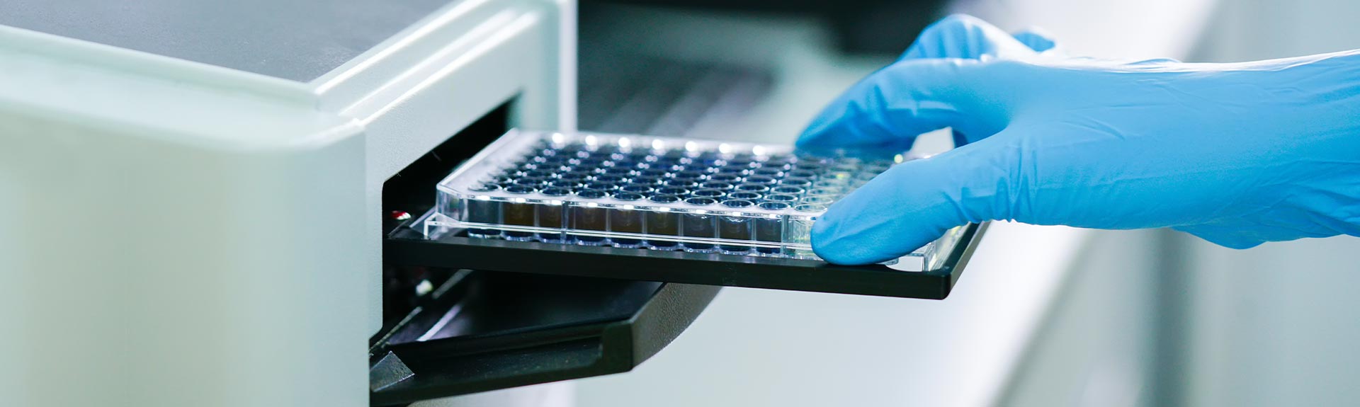 Researcher using lab equipment