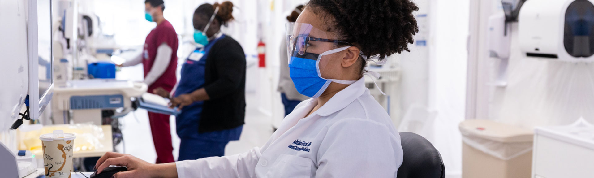 Researchers wearing masks