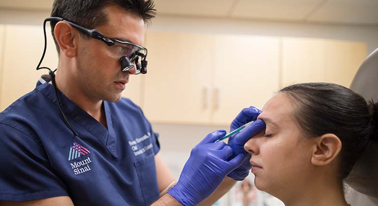 Image of Dr. Hooman Khorasani with patient