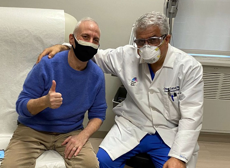 Photo of Masked Patient and Doctor