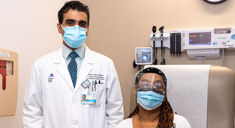 Doctor and patient wearing masks
