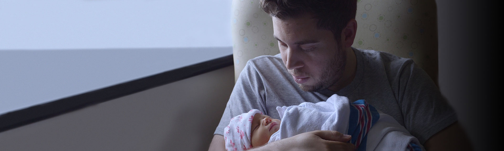 Father holding baby