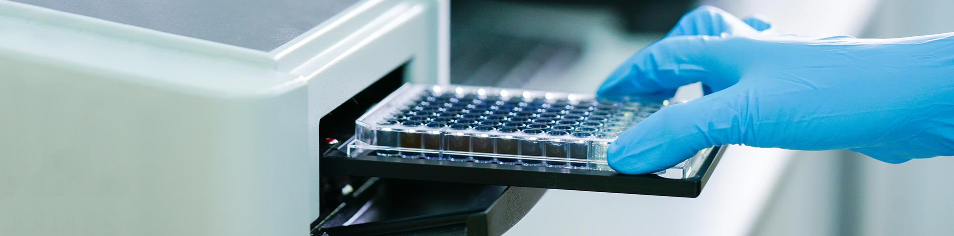 Researcher using lab equipment