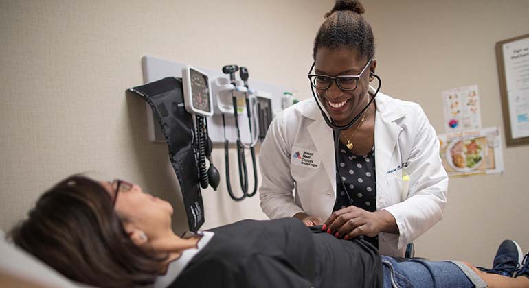 Doctor examining patient