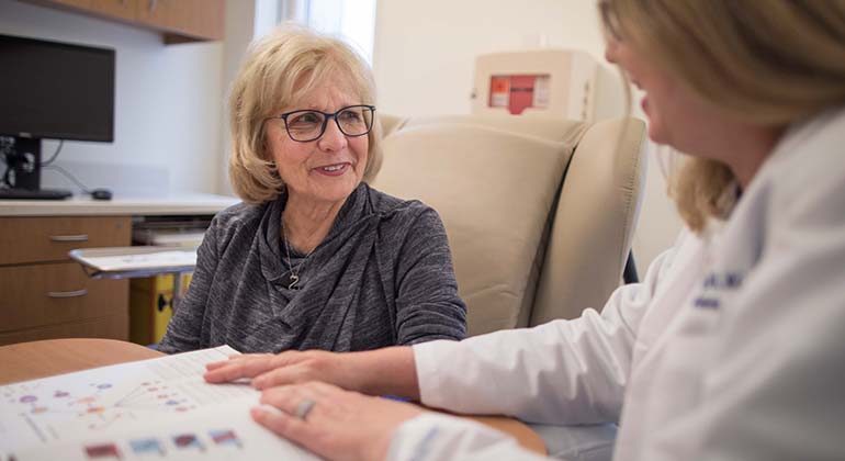 Doctor explaining diagram to patient