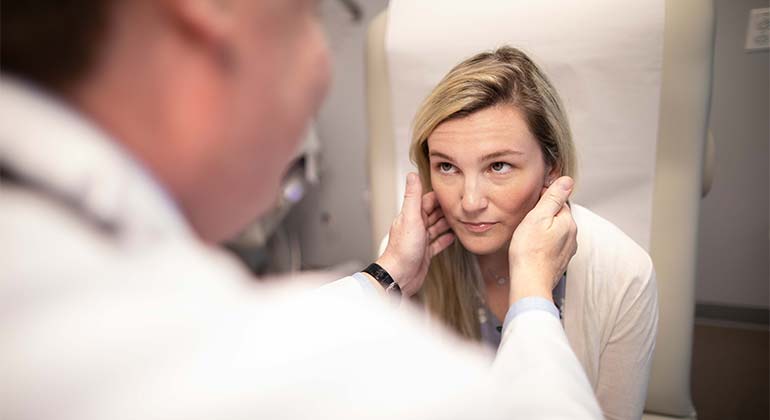 Doctor examining patient