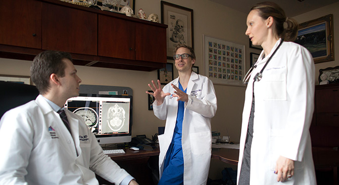 medical staff discussing together in an office