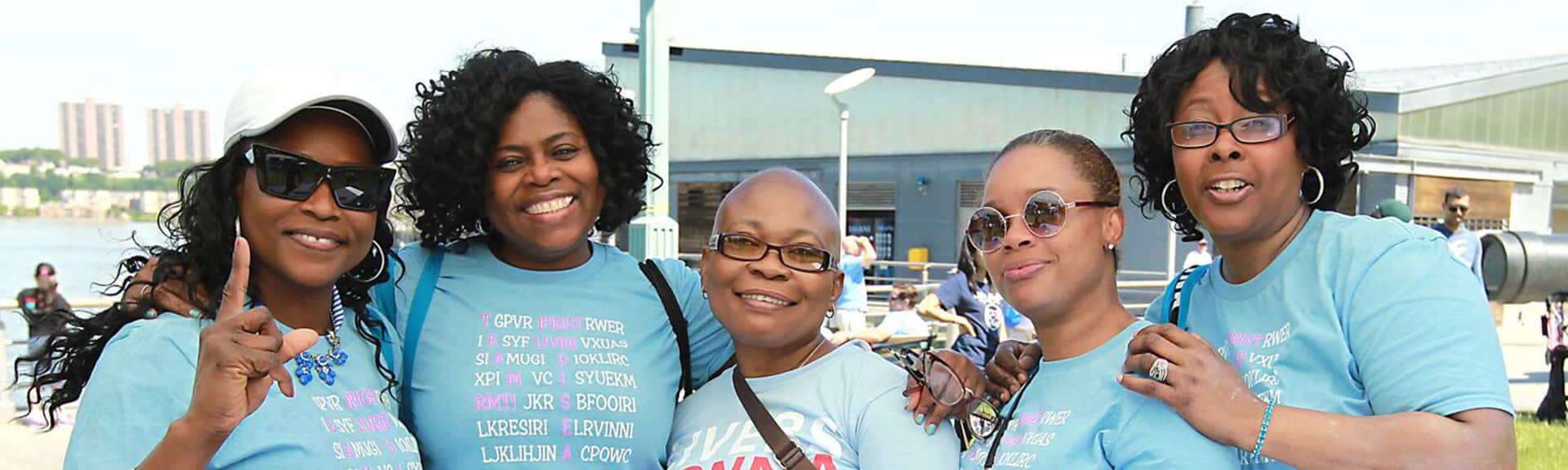 Image of five women with transplant patient at an event