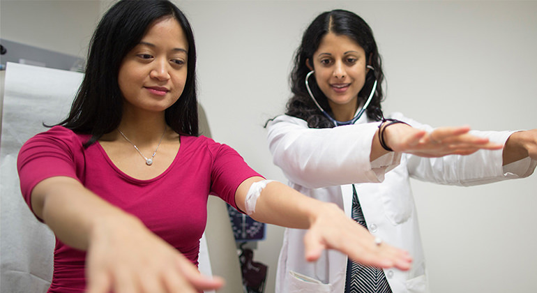 Doctor and patient with hands out