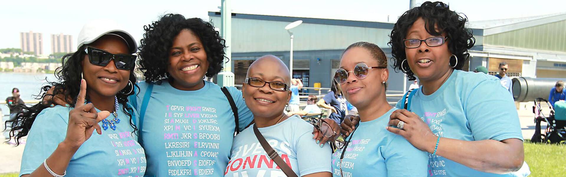 Image of five women with transplant patient at an event