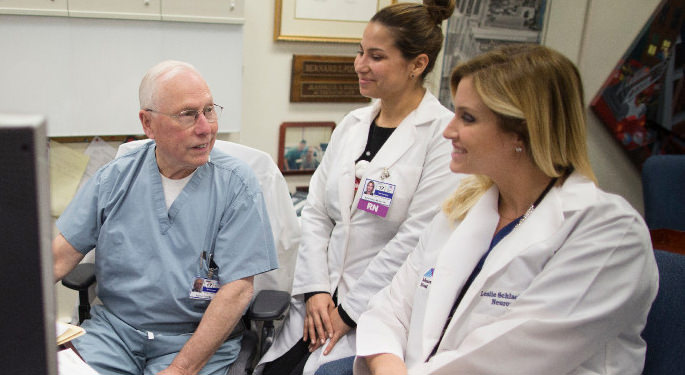 image of Dr. Post and faculty in office setting