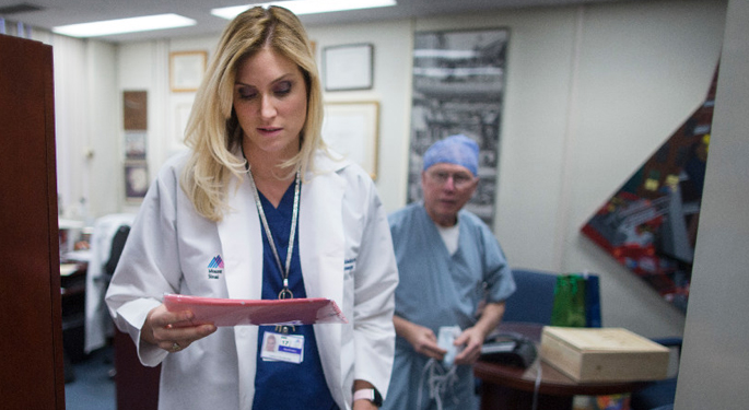 image of Dr. Schlacter walking out of Dr. Posts’ office, with Dr. Post in the background