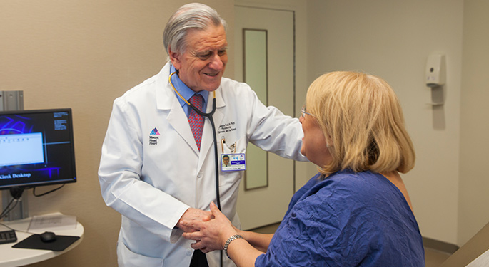 Image of Dr. Valentin Fuster with patient