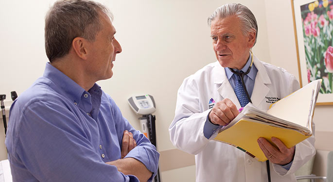 Image of Dr. Valentin Fuster with patient