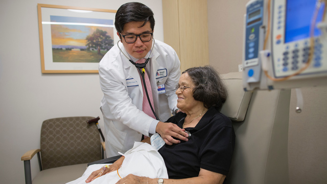 doctor examining patient