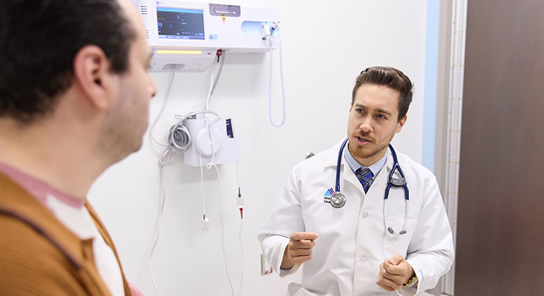 Image of patient talking to doctor